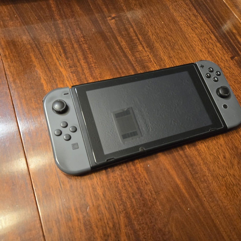 Nintendo Switch Console with Black Accessories - Picture 2 of 3